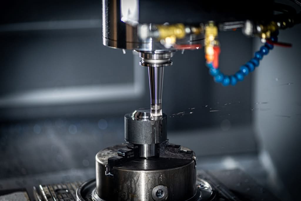 Precision CNC machining holding a tight tolerance on a metal part