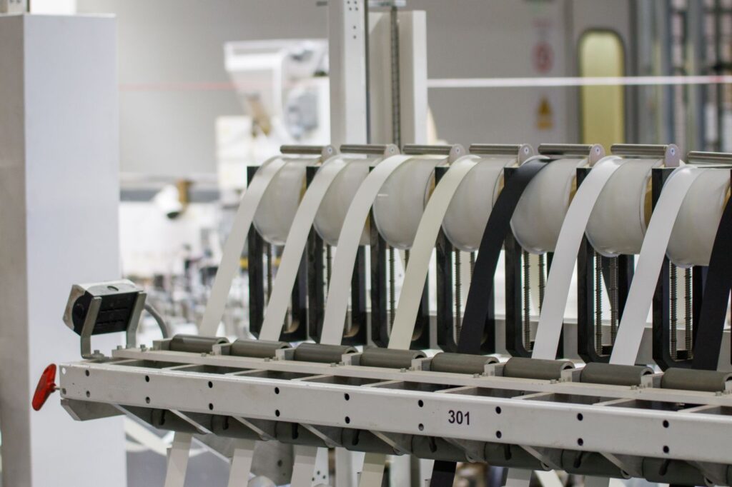 Automated manufacturing facility with equipment running in sequence, the layout question every shop answers before automating a laser